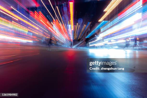 car lights at night. - headlight stock pictures, royalty-free photos & images