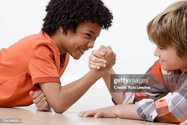 Arm Wrestling Kids Photos And Premium High Res Pictures Getty Images arm-wrestling-kids-photos-and-premium-high-res-pictures-getty-images