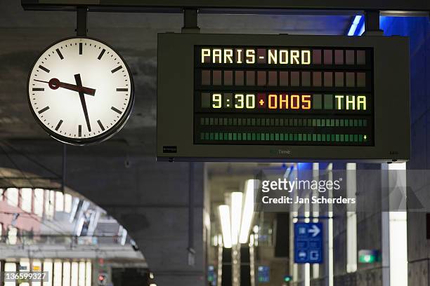 belgium, antwerpen, arrival-departure board in train station - arrival time stock pictures, royalty-free photos & images