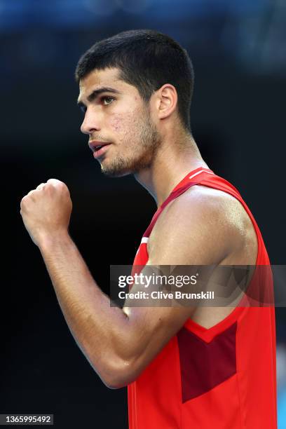Carlos Alcaraz of Spain celebrates winning a point in his third round singles match against Matteo Berrettini of Italy during day five of the 2022...