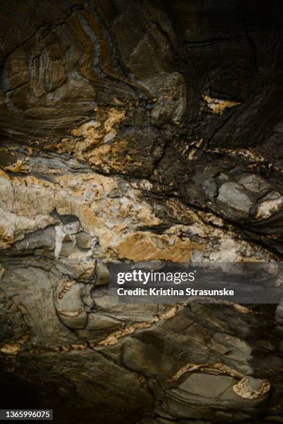 closeup of a texture of a rock - gold mineral stock pictures, royalty-free photos & images