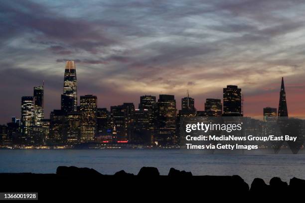 The San Francisco skyline is seen during sunset in this view from Treasure Island in San Francisco, Calif., on Thursday, Jan. 12, 2022.