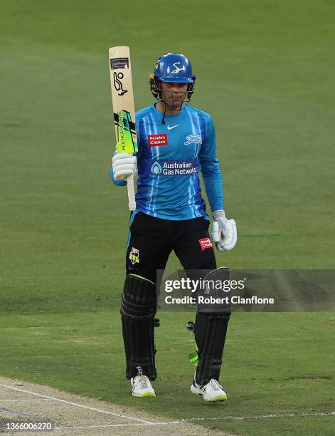 Alex Carey of the Strikers celebrates after scoring his half century during the Men's Big Bash League The Eliminator Final match between the Adelaide...