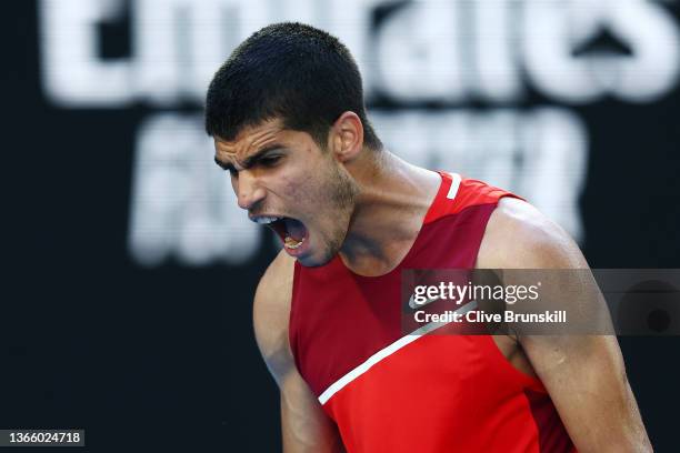Carlos Alcaraz of Spain reacts in his third round singles match against Matteo Berrettini of Italy during day five of the 2022 Australian Open at...