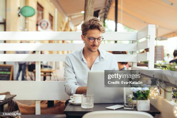 young man in the city - stock market traders stock pictures, royalty-free photos & images