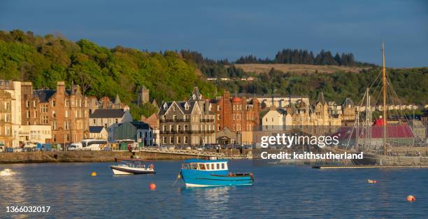 boats anchored in oban harbour, argyll and bute, scotland, uk - lorne ストックフォトと画像