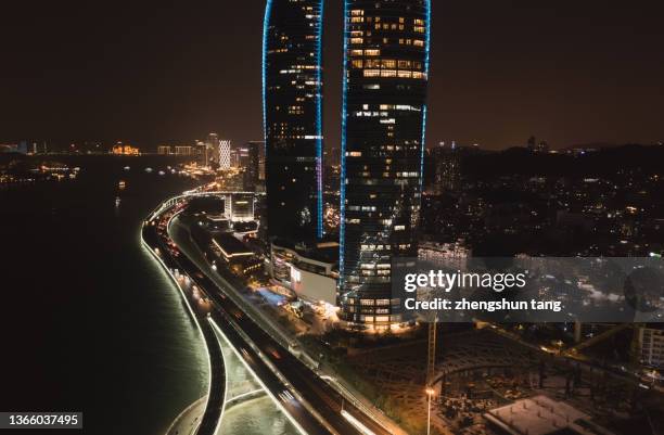 aerial view of futuristic xiamen twin towers skyscrapers. - kuala lumpur road stock pictures, royalty-free photos & images
