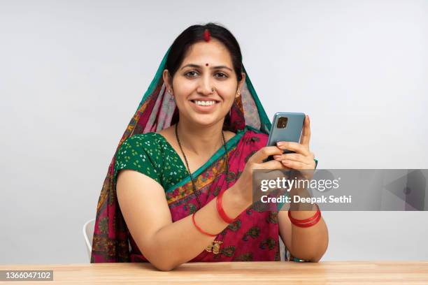 woman in sari stock photo - sari isolated stock pictures, royalty-free photos & images