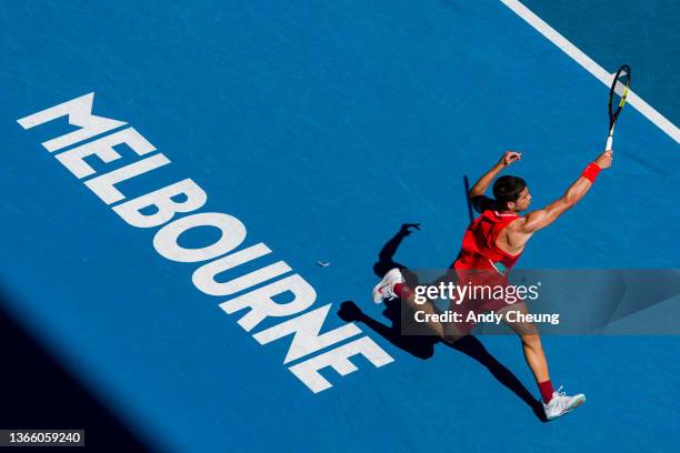 Carlos Alcaraz of Spain plays a forehand in his third round singles match against Matteo Berrettini of Italy during day five of the 2022 Australian...