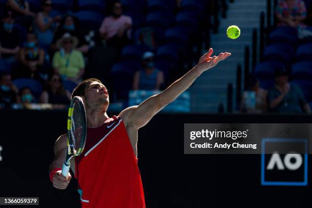 Carlos Alcaraz of Spain serves in his third round singles match against Matteo Berrettini of Italy during day five of the 2022 Australian Open at...