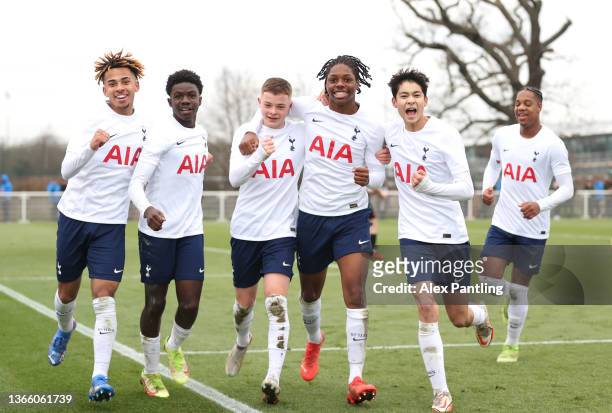 Thomas Bloxham of Tottenham Hotspur celebrates after scoring their sides sixth goal with team mates during the U18 - FA Youth Cup match between...