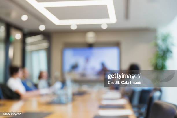 defocused business people video conferencing in office meeting - bokeh computer screen stock pictures, royalty-free photos & images