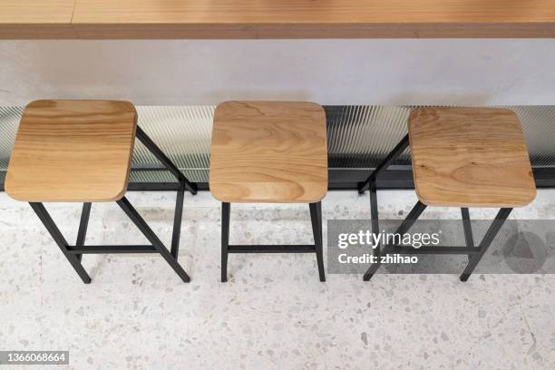 high angle view of a row of chairs - tabouret photos et images de collection