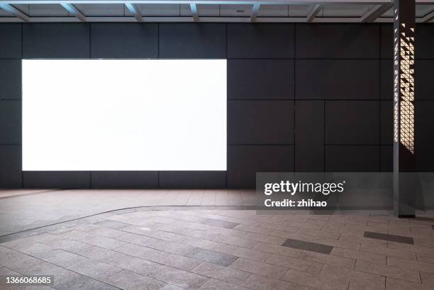 led advertising screen on the wall - affiche mur photos et images de collection