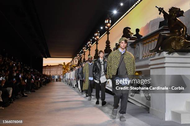 Models walk the runway during the Dior Homme Menswear Fall/Winter 2022-2023 show as part of Paris Fashion Week on January 21, 2022 in Paris, France.