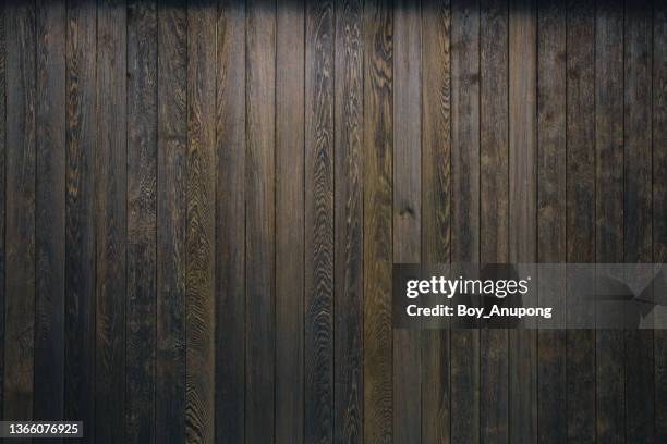 view of dark wooden panel background. - bauholz brett stock-fotos und bilder
