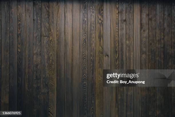 view of dark wooden panel background. - black wood stockfoto's en -beelden