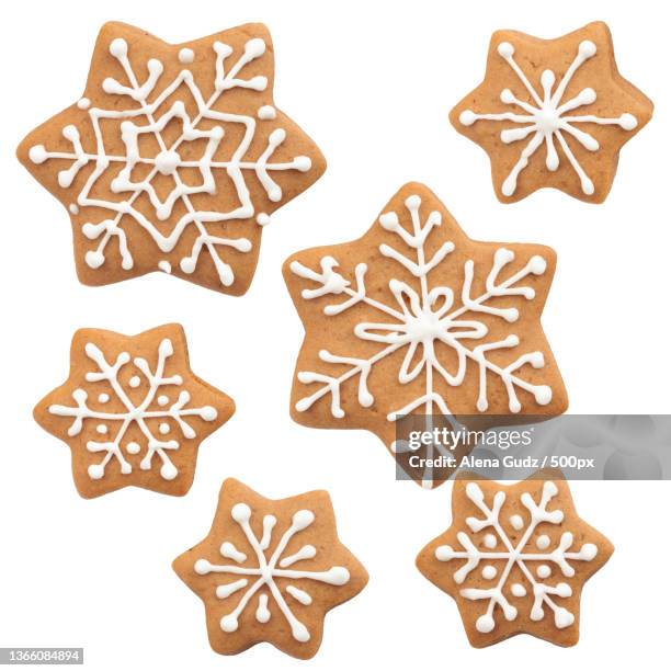 gingerbread cookies,full frame shot of gingerbread cookies against white background - sugar cookie stock pictures, royalty-free photos & images