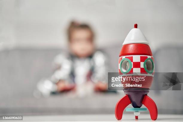 red space rocket - toy rocket stock pictures, royalty-free photos & images