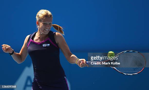 Melinda Czink of Hungary plays a forehand during her first round match against Chanelle Scheepers of South Africa during day two of the 2012 Sydney...