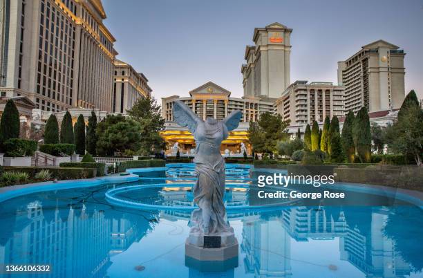 The entrance to Caesars Palace Hotel & Casino is reflected in the early morning light as viewed on January 9, 2022 in Las Vegas, Nevada. Conventions,...