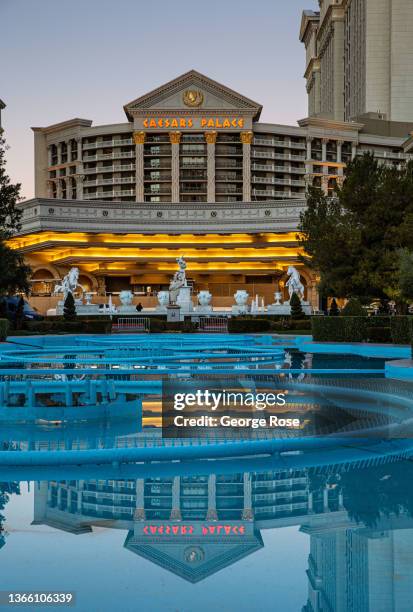 The entrance to Caesars Palace Hotel & Casino is reflected in the early morning light as viewed on January 9, 2022 in Las Vegas, Nevada. Conventions,...