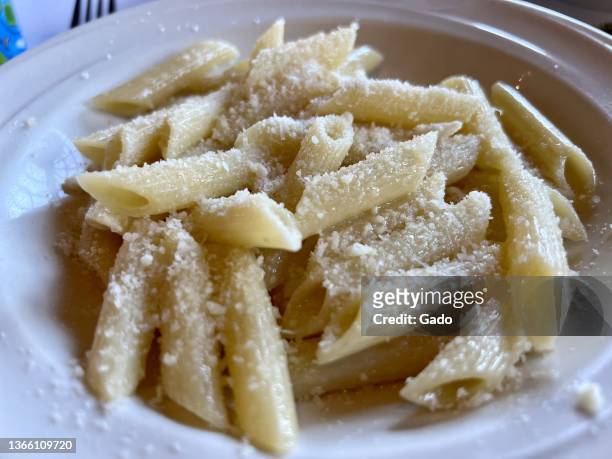Bowl of buttered penne noodles with parmesan cheese at Mezzaluna by the Sea, an Italian cuisine restaurant in Half Moon Bay, California, January 2,...