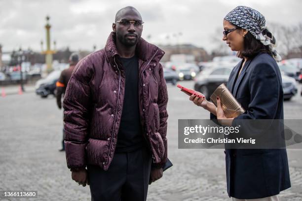 Guests seen wearing Dior jacket outside Dior during Paris Fashion Week - Menswear F/W 2022-2023 on January 21, 2022 in Paris, France.