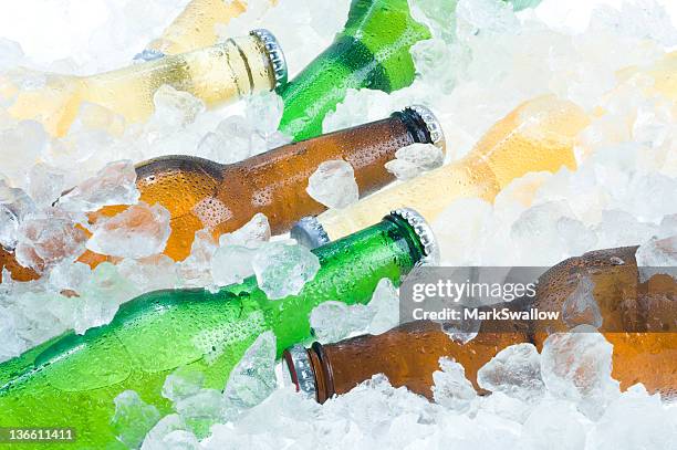 beer in ice - beer bottle stock pictures, royalty-free photos & images