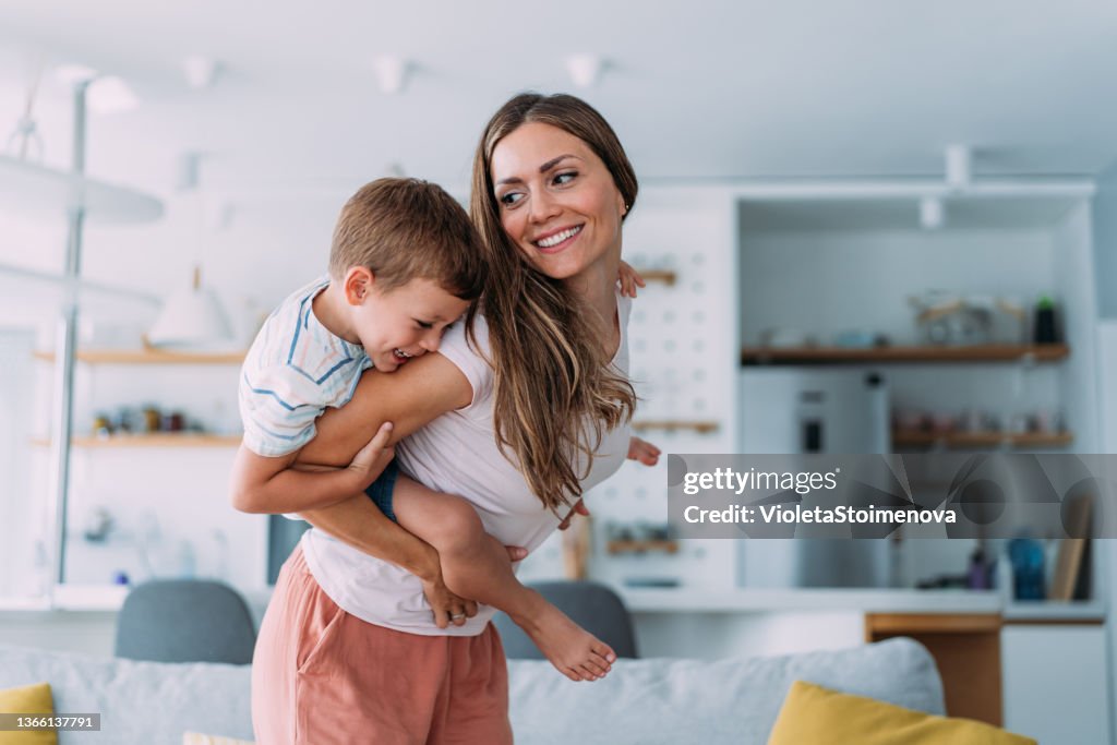 Mother and son at home.