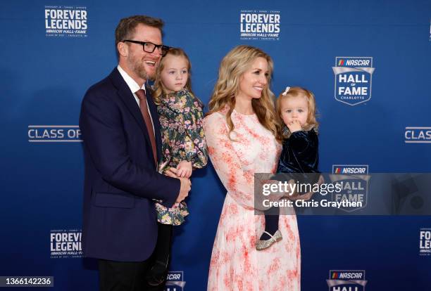 Hall of Fame inductee Dale Earnhardt Jr., his wife Amy Earnhardt, and their daughters Isla and Nicole, pose on the red carpet prior to the 2021...