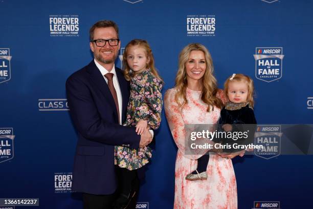 Hall of Fame inductee Dale Earnhardt Jr., his wife Amy Earnhardt, and their daughters Isla and Nicole, pose on the red carpet prior to the 2021...
