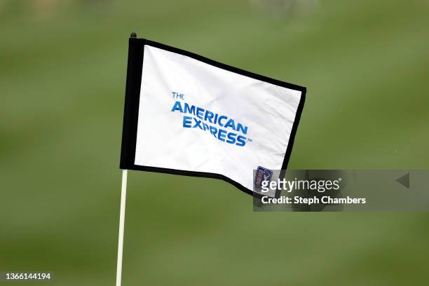 The American Express logo is seen on the flag of a hole setter during the second round of The American Express at the Jack Nicklaus Tournament Course...