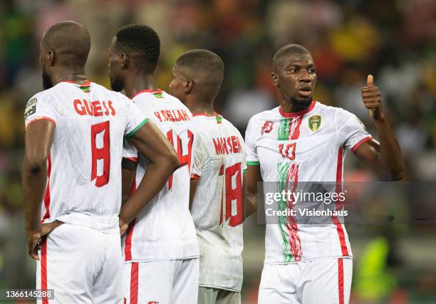 Of Mauritania organises the defensive wall during the Group F Africa Cup of Nations 2021 match between Mali and Mauritania at Stade de Japoma in...