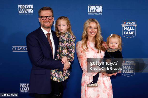 Hall of Fame inductee Dale Earnhardt Jr., his wife Amy Earnhardt, and their daughters Isla and Nicole, pose on the red carpet prior to the 2021...