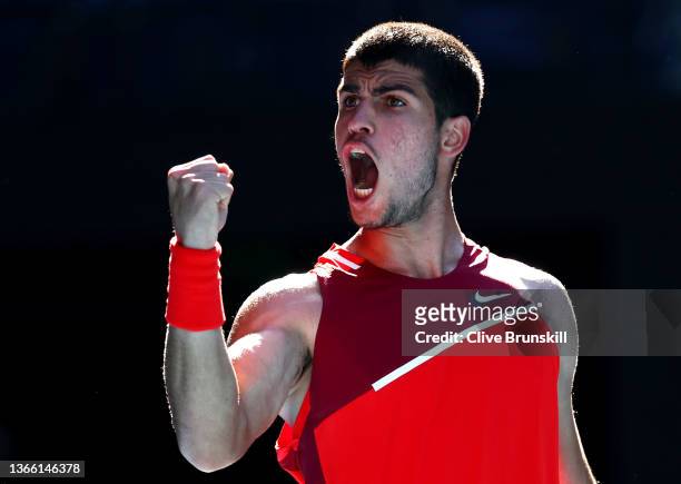 Carlos Alcaraz of Spain celebrates a point in his third round singles match against Matteo Berrettini of Italy during day five of the 2022 Australian...