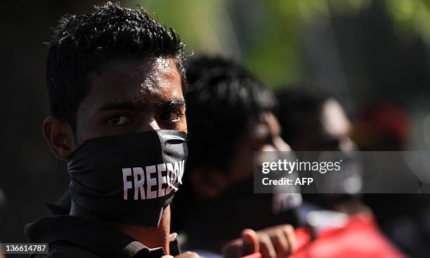 Sri Lanka's Marxist People Party attend a demonstration demanding governmental actions to find hundreds of people who have disappeared during decades...