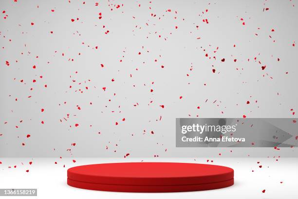 round red podium on gray background with many falling small red hearts. concept of valentine's day celebration. perfect platform for showing your products. three dimensional illustration - stage decoration stock pictures, royalty-free photos & images