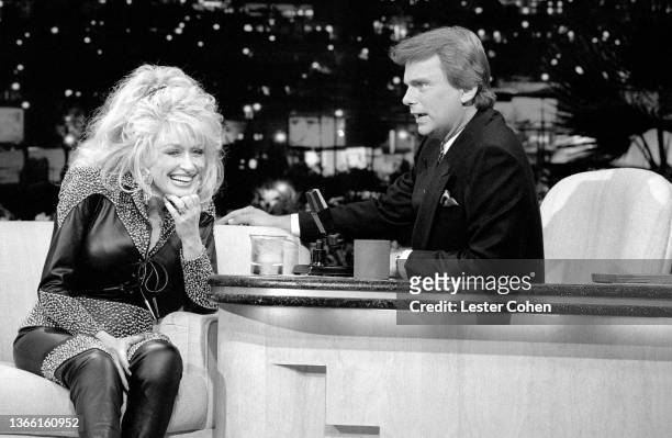 American singer, songwriter, multi-instrumentalist, actress, author, businesswoman and humanitarian Dolly Parton talks with American television...