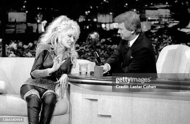 American singer, songwriter, multi-instrumentalist, actress, author, businesswoman and humanitarian Dolly Parton talks with American television...