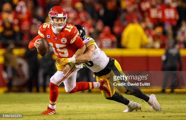 Alex Highsmith of the Pittsburgh Steelers sacks Patrick Mahomes of the Kansas City Chiefs for a loss during the first quarter of the AFC Wild Card...