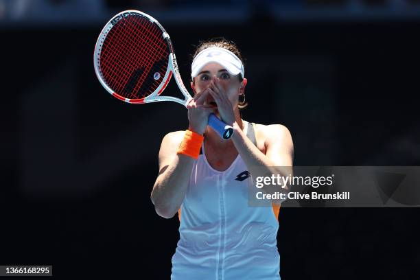 Alize Cornet of France celebrates match point in her third round singles match against Tamara Zidansek of Slovakia during day six of the 2022...