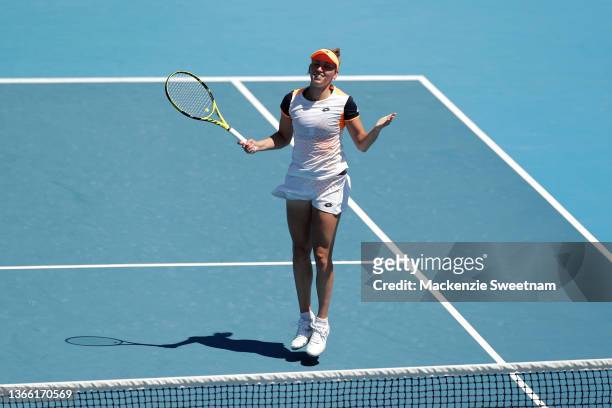 Elise Mertens of Belgium celebrates match point in her third round singles match against Shuai Zhang of China during day six of the 2022 Australian...