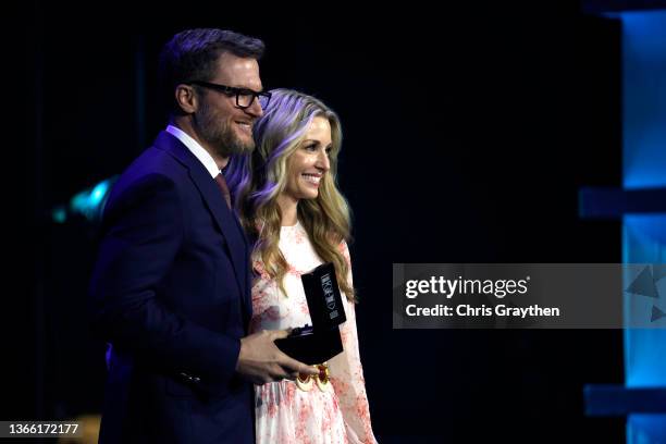 Amy Earnhardt officially inducts her husband, Dale Earnhardt Jr. Into the NASCAR Hall of Fame during the 2021 NASCAR Hall of Fame Induction Ceremony...