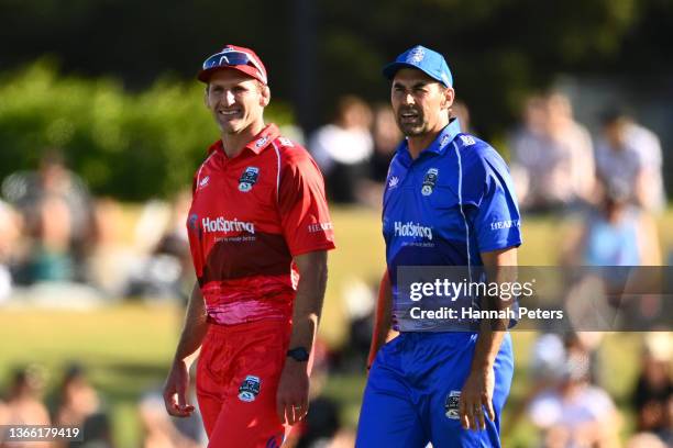 Kieran Read of Team Rugby and Stephen Fleming of Team Cricket walk off the field during the Black Clash T20 cricket match between Team Cricket and...