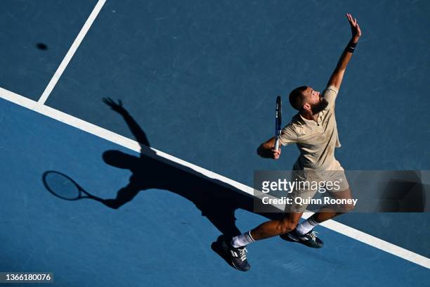 Benoit Paire of France serves in his third round singles match against Stefanos Tsitsipas of Greece during day six of the 2022 Australian Open at...