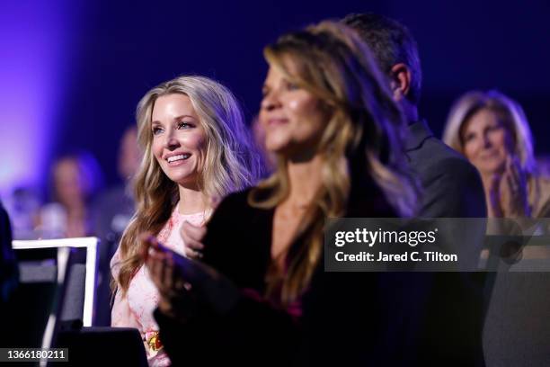 Amy Earnhardt, the wife of NASCAR Hall of Fame inductee Dale Earnhardt Jr.looks on during the 2021 NASCAR Hall of Fame Induction Ceremony at NASCAR...