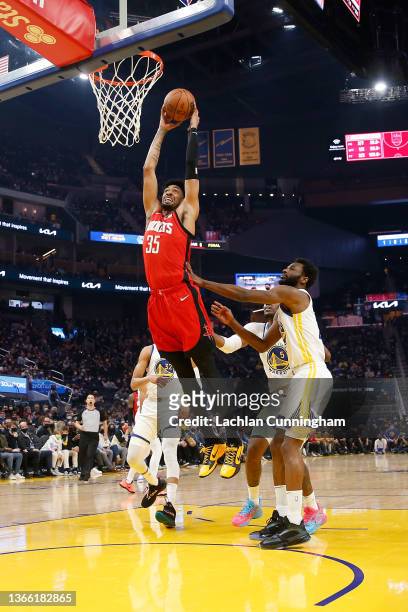 Christian Wood of the Houston Rockets dunks the ball in the first half against the Golden State Warriors at Chase Center on January 21, 2022 in San...