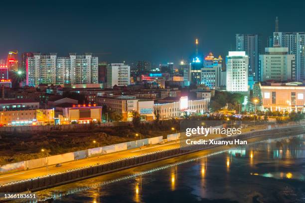 view of neon signs in zhangjiakou at night, hebei, china - provinz hebei stock-fotos und bilder