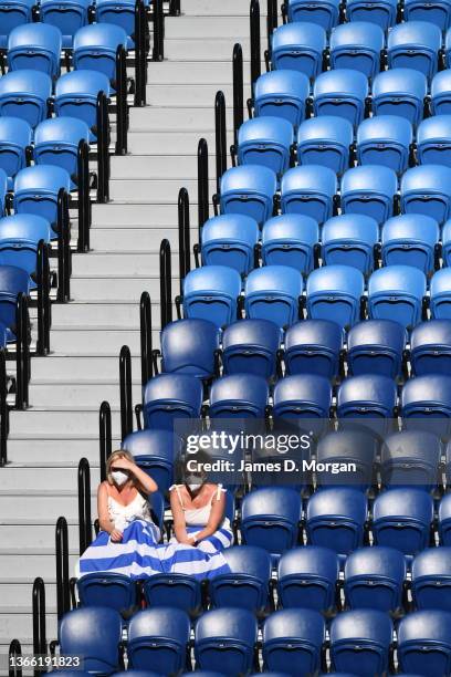 Fans in Rod Laver Arena watch Stefanos Tsitsipas of Greece in his third round singles match against Benoit Paire of France during day six of the 2022...